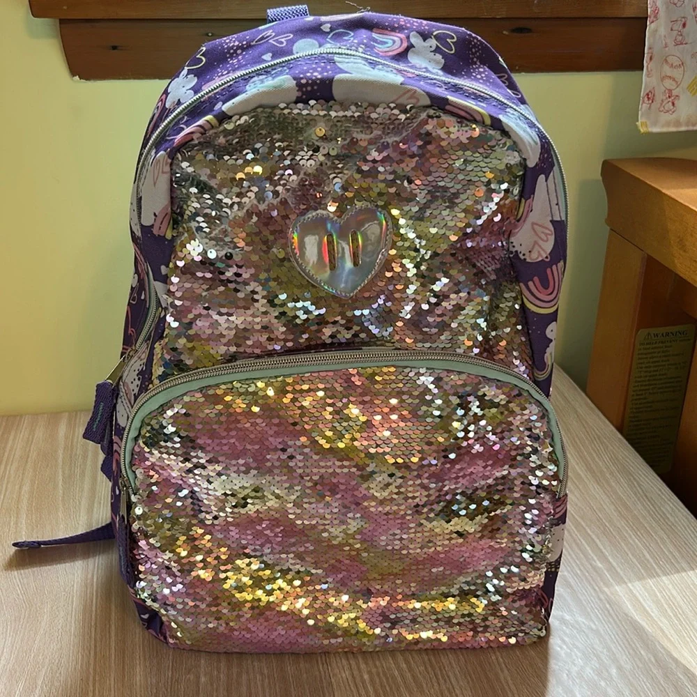 Purple rainbows and sparkles backpack